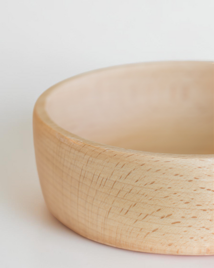 Ecohub NZ Entertainers Beech Handled Snack Bowl (15cm) - natural beech wood - close-up of the bowl's edge showing wood grain on white