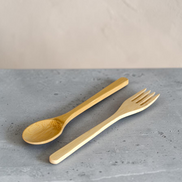 Ecohub NZ Essentials Bamboo Cutlery Set of 2 - natural bamboo - fork and spoon resting on a grey concrete surface
