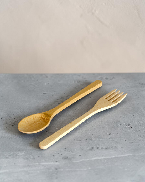 Ecohub NZ Essentials Bamboo Cutlery Set of 2 - natural bamboo - fork and spoon resting on a grey concrete surface