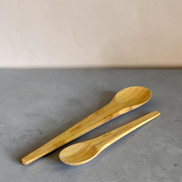 Ecohub NZ Essentials Bamboo Mixing & Serving Spoons Set of 2 - natural sustainable bamboo - close-up on textured grey concrete surface