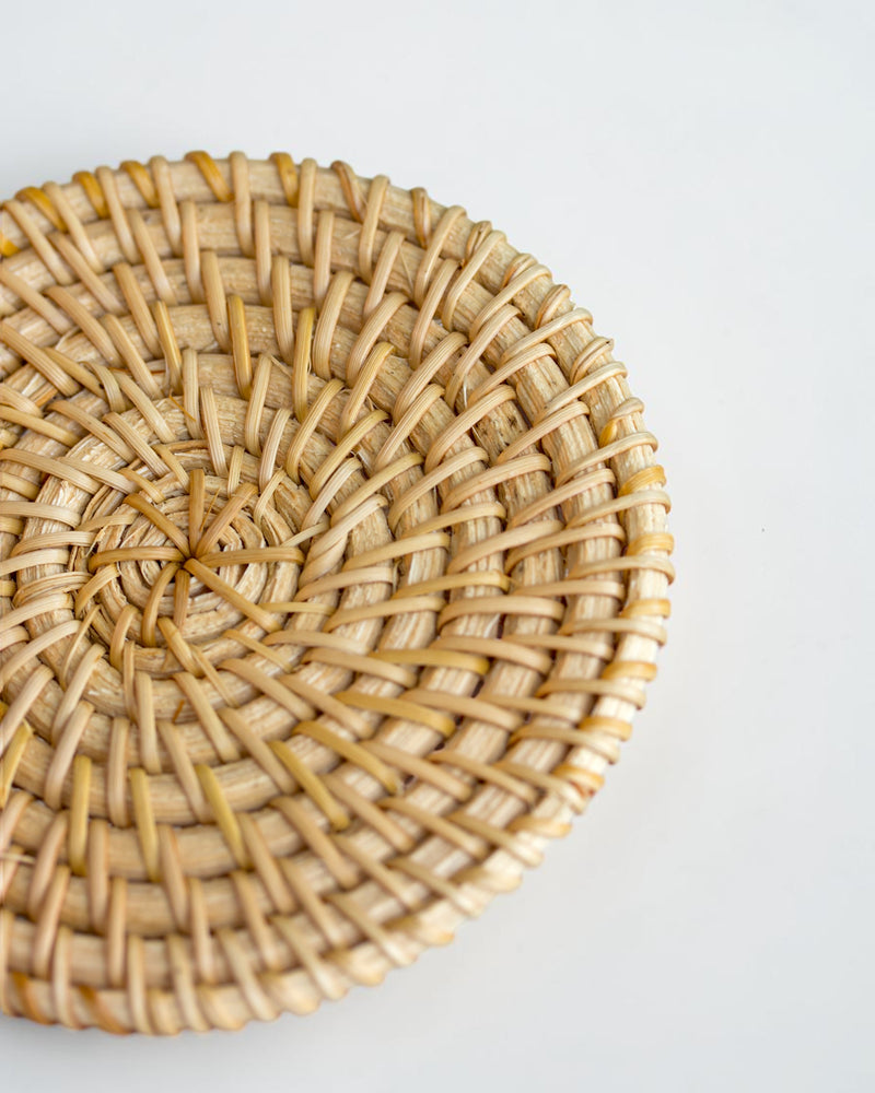 Ecohub NZ Artisans Rattan Coaster Set of 6 - natural woven rattan - close-up top view showing intricate weave on white