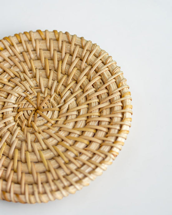 Ecohub NZ Artisans Rattan Coaster Set of 6 - natural woven rattan - close-up top view showing intricate weave on white