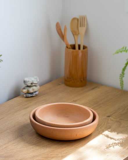 Ecohub NZ Entertainers Beech Nesting Bowl Set of 2 - natural beech wood - nested together on a wooden kitchen counter