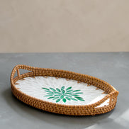 Ecohub NZ Artisans Rattan & Pearl Inlay Oval Serving Tray (31cm) - rattan and pearl - empty on grey concrete