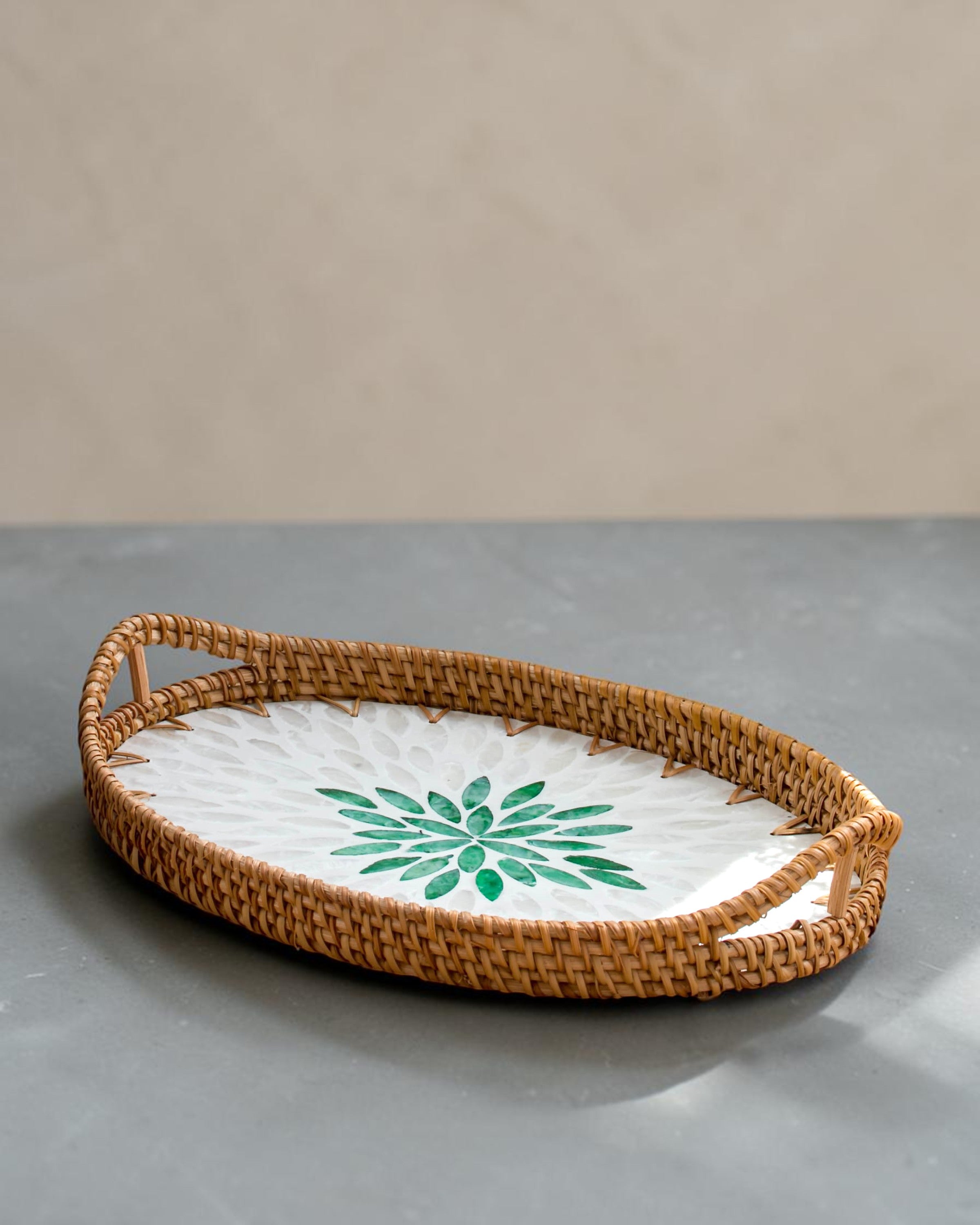 Ecohub NZ Artisans Rattan & Pearl Inlay Oval Serving Tray (31cm) - rattan and pearl - empty on grey concrete
