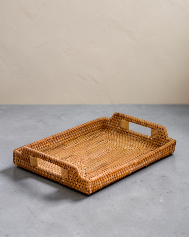 Ecohub NZ Artisans Rattan Rectangular Serving Tray (34cm) - natural rattan - empty on a grey concrete surface