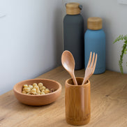 Ecohub NZ Essentials Bamboo Cutlery Organiser - natural bamboo - holding small spoon and fork on a wooden counter