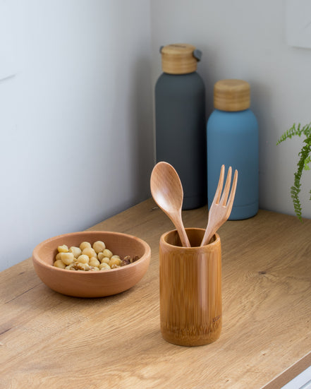 Ecohub NZ Essentials Bamboo Cutlery Organiser - natural bamboo - holding small spoon and fork on a wooden counter