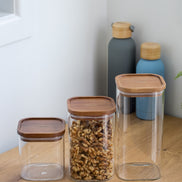 Ecohub NZ Essentials Square Acacia & Glass Pantry Jar (1L) - glass and acacia - empty on a wood counter