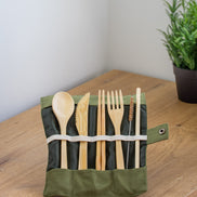 Ecohub NZ Essentials Bamboo Travel Cutlery Set of 7 - natural bamboo - unrolled standing in pouch on a wood counter
