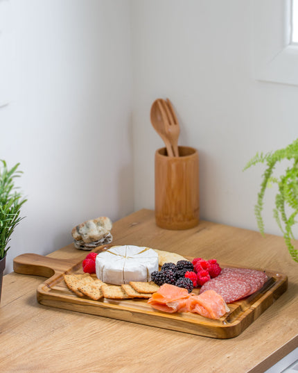 Ecohub NZ Entertainers Teak Grazing Paddle Board (39x22cm) - natural teak wood - serving charcuterie on a wood counter
