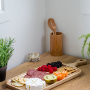 Ecohub NZ Entertainers Ash Serving Paddle Board (50x20cm) - natural ash wood - serving charcuterie on a wood counter