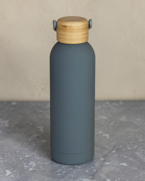 Ecohub NZ Palette Insulated Water Bottle (500ml) Slate Grey - matte and bamboo - standing on a grey concrete surface