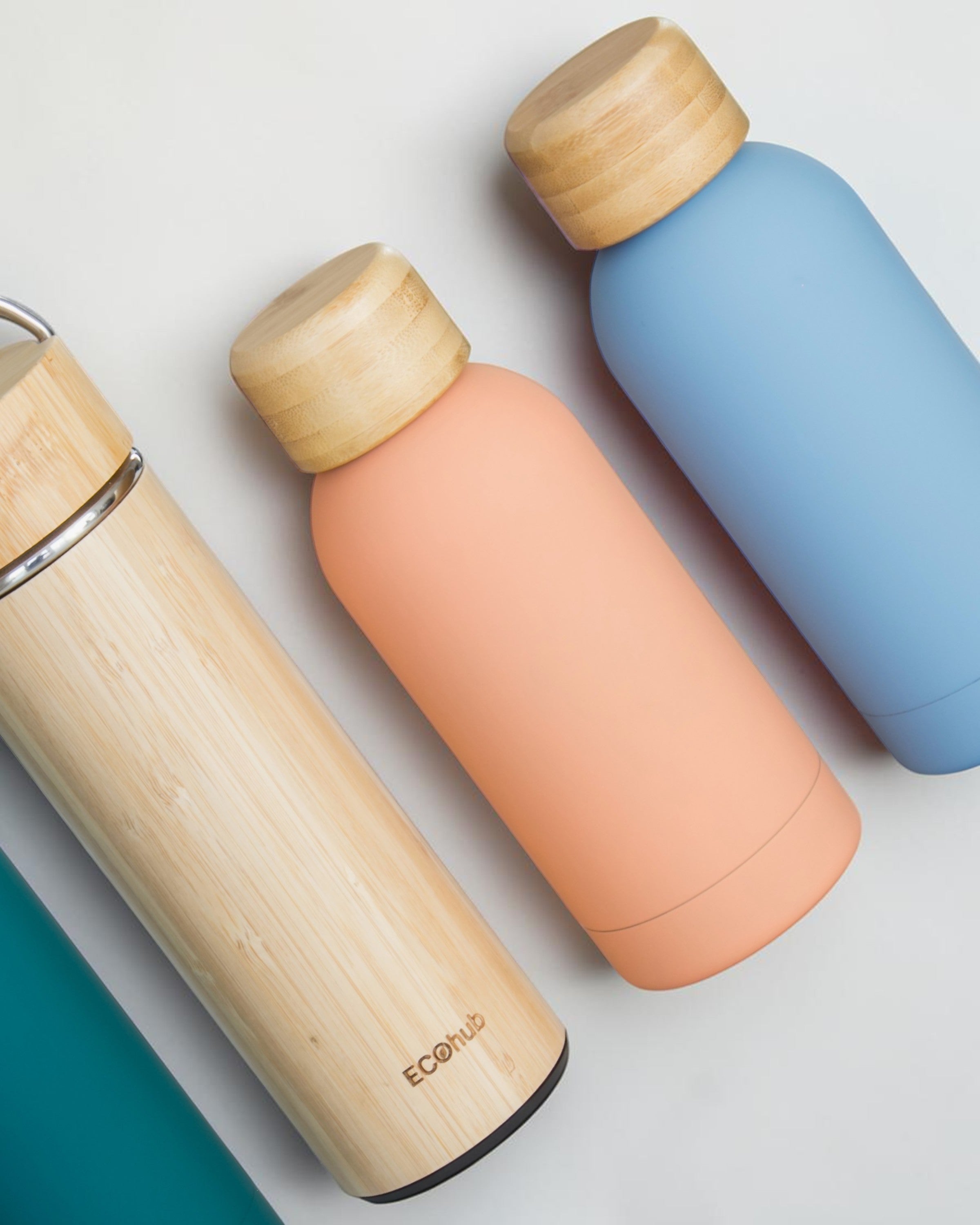 Ecohub NZ Palette Mini Insulated Water Bottle (350ml) Soft Peach - matte and bamboo - grouped with other bottles on white