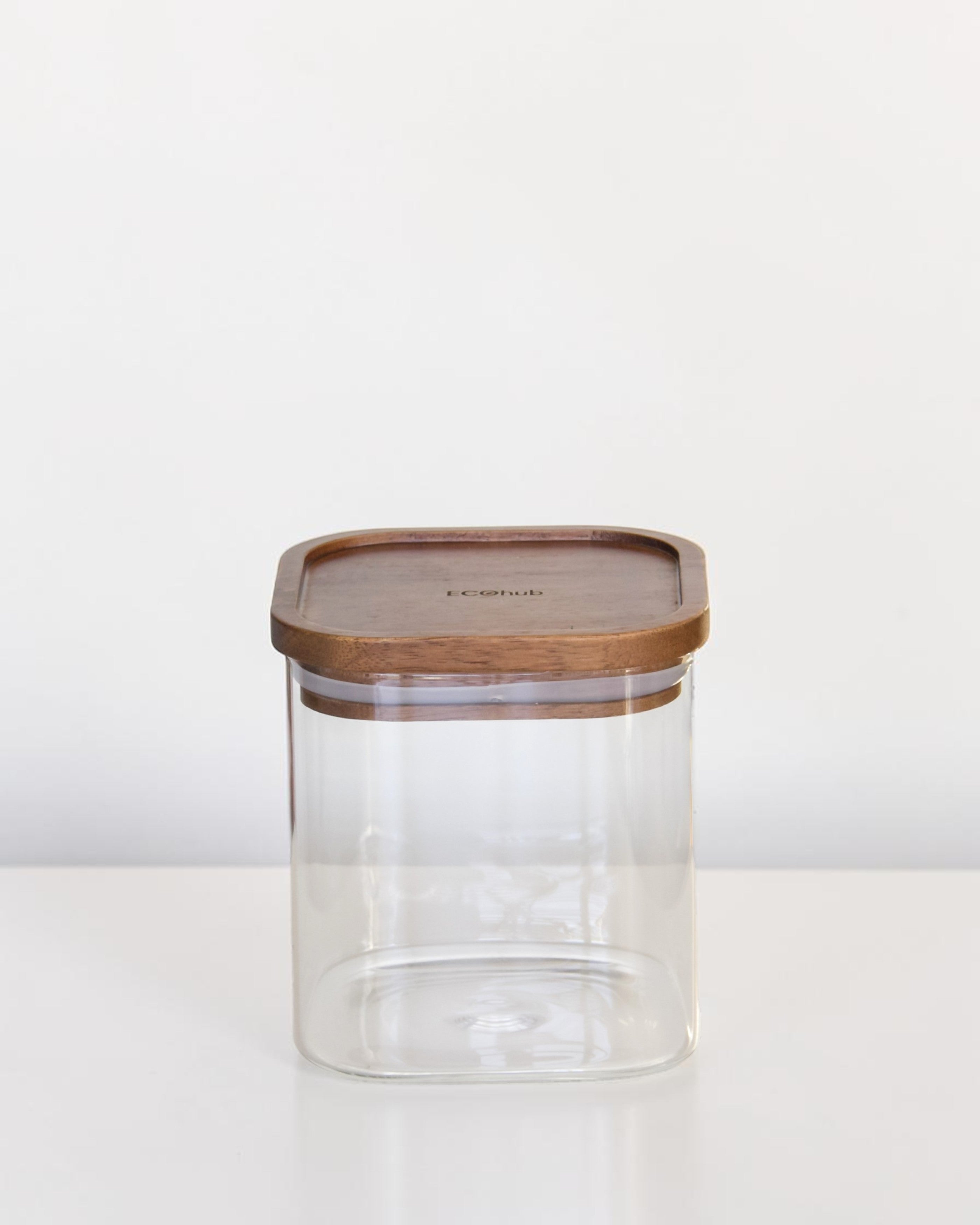 Ecohub NZ Essentials Square Acacia & Glass Pantry Jar (1L) - glass and acacia - empty standing on a white surface