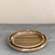 Ecohub NZ Entertainers Acacia Nesting Plate Set of 2 - natural acacia wood - nested on textured grey concrete