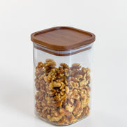 Ecohub NZ Essentials Square Acacia & Glass Pantry Jar (1.2L) - glass and acacia - filled with walnuts on white
