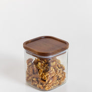 Ecohub NZ Essentials Square Acacia & Glass Pantry Jar (1L) - glass and acacia - filled with walnuts on white
