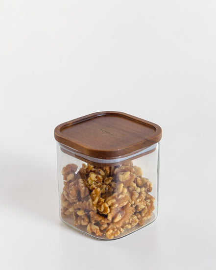 Ecohub NZ Essentials Square Acacia & Glass Pantry Jar (1L) - glass and acacia - filled with walnuts on white