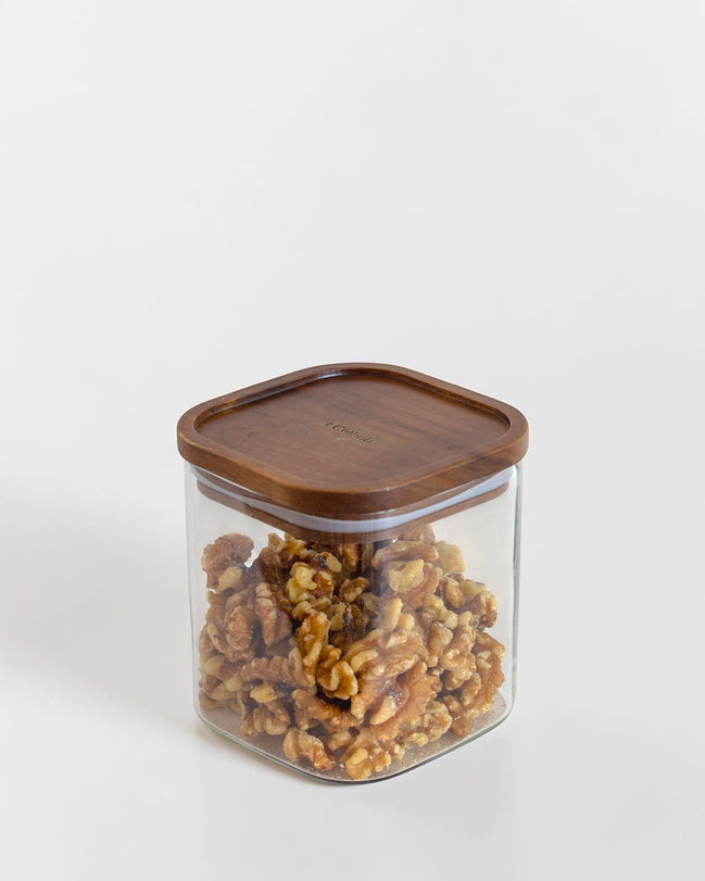 Ecohub NZ Essentials Square Acacia & Glass Pantry Jar (1L) - glass and acacia - filled with walnuts on white